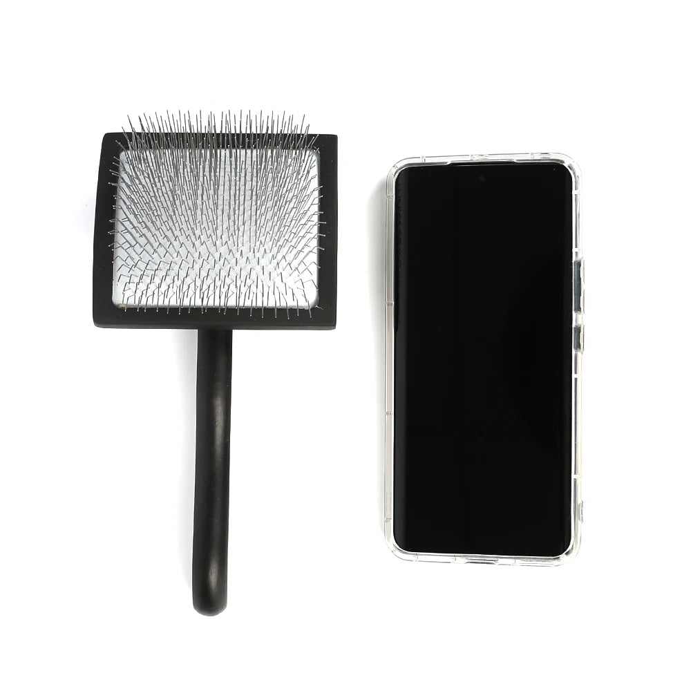 Large wooden handled slicker brush